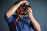 Handmade leather shoulder camera strap with adjustable width, designed for photographers and accessories enthusiasts