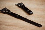 Handmade leather slider accessory designed for Peak Design Anchor system, suitable for attaching and adjusting gear on photography equipment.