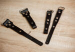 Handcrafted leather slider designed for Peak Design Anchor system, compatible with various photography accessories and gear.