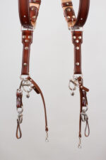 Handmade leather camera strap set with detailed stitching, suitable for photographers and accessories enthusiasts
